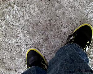 young woman faces intense casting interview on the sofa