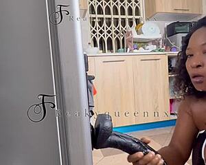 Hot MILF camgirl rams 14-INCH dildo hard against kitchen fridge