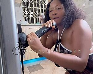 Hot MILF camgirl rams 14-INCH dildo hard against kitchen fridge