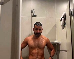 Gym shower flashes red thong panties close up