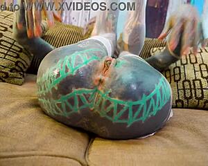 Tattoo petite slut in fishnets high heels gapes asshole with huge dildo solo