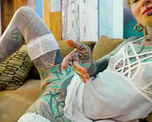 Tattoo petite slut in fishnets high heels gapes asshole with huge dildo solo