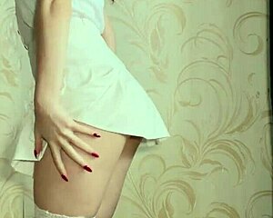 Naughty skinny redhead rides transparent dildo in see-through lingerie stockings