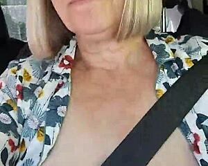 snapped a quick selfie flashing tits right in the car