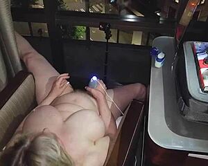 granny strips naked 😏 masturbates hard with city lights watching 👀