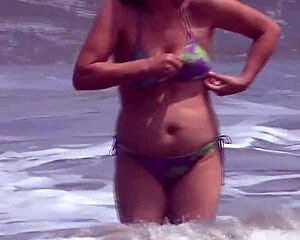 59yo latina milf in bikini flashes huge natural tits and pussy on beach