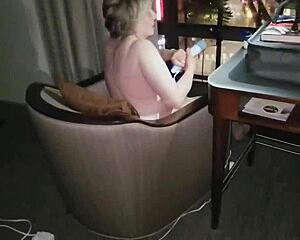 granny strips naked 😏 masturbates hard with city lights watching 👀