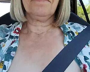 snapped a quick selfie flashing tits right in the car