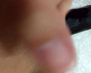 amateur wife bounces homemade toy in playful homemade scene