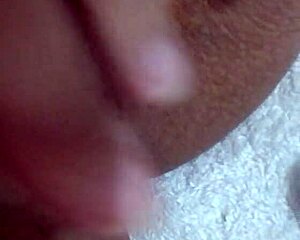 amateur wife bounces homemade toy in playful homemade scene