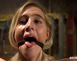 blonde bimbo bound and dominated in piercing play session