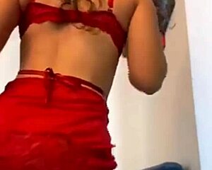 woman slips into tight red panties for teasing bedroom reveal