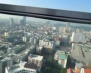 bikini model with feettattoo lounges by pattaya rooftop pool