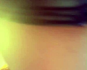 tattooed brunette sways seductively in leather lingerie