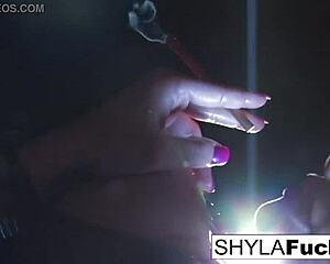 sexy shyla stylez smokes while teasing her big tits and pussy