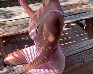 italian milf artemisia love flaunts her big tits and perfect body outdoors in florida with a smoke