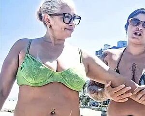 me and my slutty friend fuck hard on the beach for everyone to watch