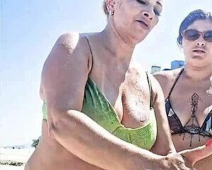 me and my slutty friend fuck hard on the beach for everyone to watch