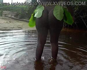 busty african grinds huge ass and tits in outdoor ritual dance