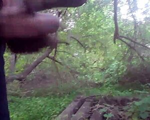 OUTDOOR CUMSHOT EXPLODES IN THE TREES!