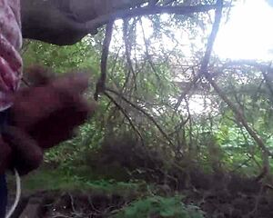 OUTDOOR CUMSHOT EXPLODES IN THE TREES!