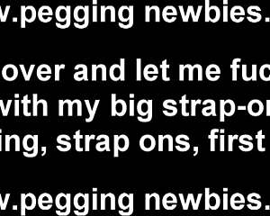 she grabs her strapon eyeing his ass ready to pound him deep in femdom play