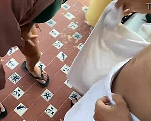 two girls sucking my huge cock on the balcony outside