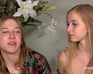 Blonde fingers her lesbian friend's shaved pussy