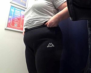 check out this pawg milf's huge ass in satin panties changing in the fitting room