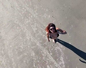 Wanna join that beach walk with her big tits bouncing?