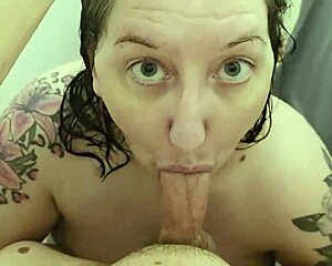 Steamy Shower Blowjob Leads to Facial Cumshot on Big Tits