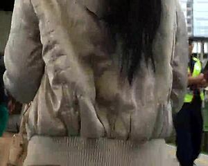 check her jacket and boots hugging that ass on the packed train pt 1