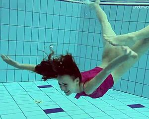 Petite Russian teen Anna Netrebko teases in bikini underwater by the pool!