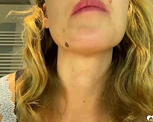 Amateur brunette milf mommy next door strips teasing huge fake tits in homemade solo show