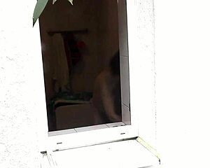 naked wife showers outdoors while neighbor watches her wet body closely