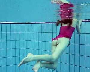 Petite Russian teen Anna Netrebko teases in bikini underwater by the pool!