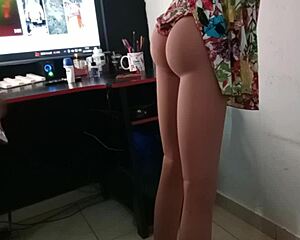 Amateur fuck doll takes it doggystyle with real sex toys