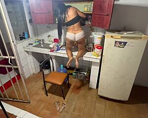 hidden cam catches my slut getting horny while i clean. we fuck like wild lesbians in kitchen