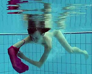 Petite Russian teen Anna Netrebko teases in bikini underwater by the pool!