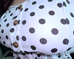 A mature woman takes hard cock between legs.