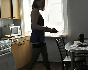 Sweet Assol's legs and ass tease in kitchen lingerie