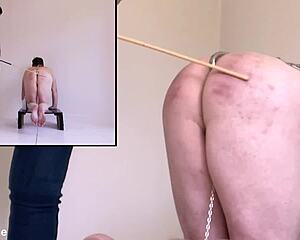 Part 1 Caning from Reverse Angle Punishes Caged Slave