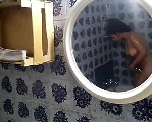 Spying on stepsister's fat ass showering unaware, hidden cam catches every curvy drop?