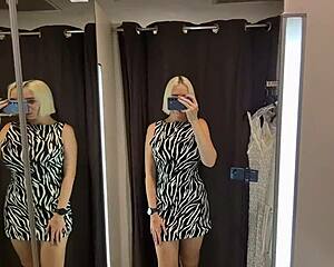 girl strips naked in mall fitting room trying on sexy clothes