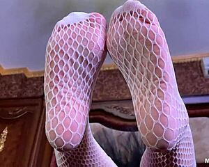 I tease you with my goddess feet in cute white fishnets right on the bed... legs spread wide for lover