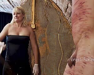 cruel blonde milf mistress brutally whips helpless guys throbbing cock