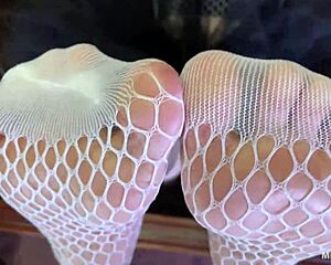 I tease you with my goddess feet in cute white fishnets right on the bed... legs spread wide for lover