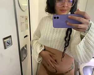 Croatian brunette with pierced nipples and tattoos pees on european plane trip