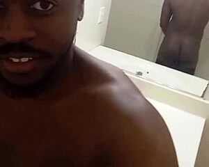 she strips down and fingers her ass in front of the mirror selfie