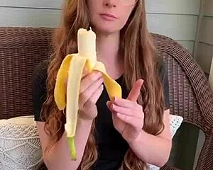 Redhead Long Hair Devours Banana Hungrily
